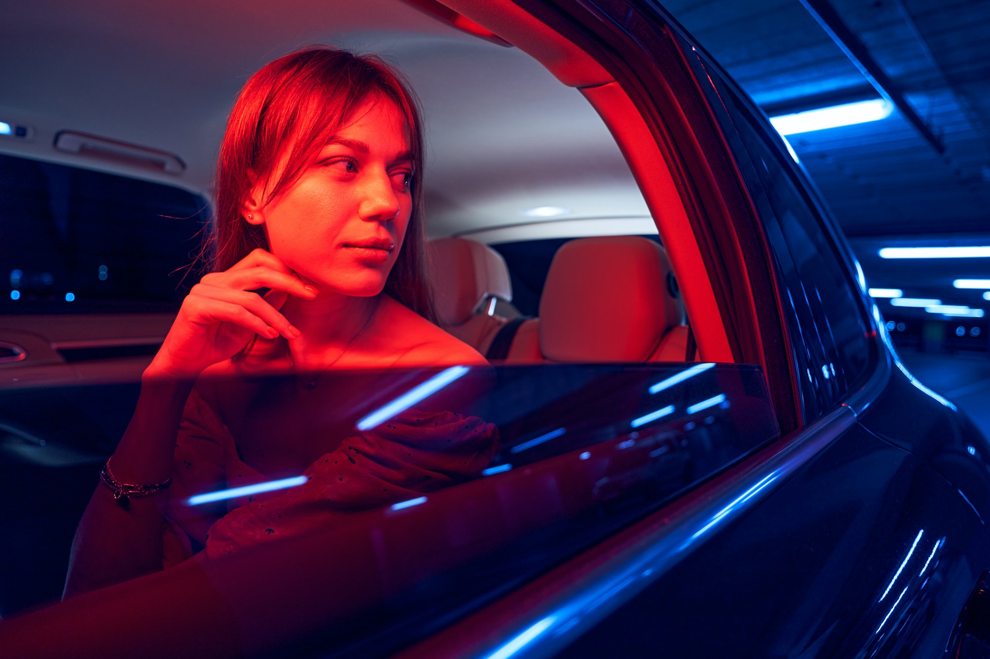 Travel woman having car trip at night